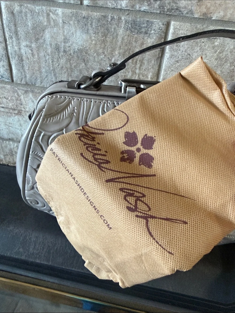 Patricia Nash Embossed Floral Frame Wristlet Bag in Taupe